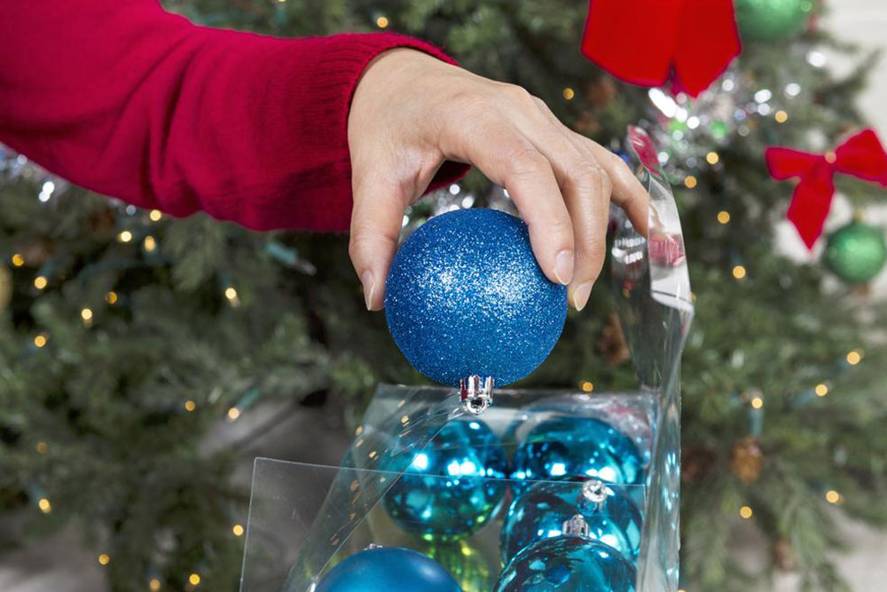 Tips for deciding if a Santa tree topper is right for your tree